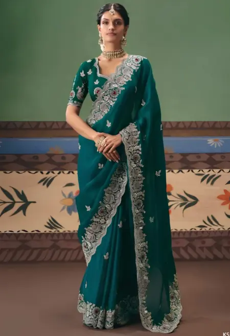 emerald green tissue silk saree